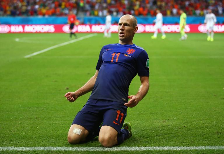 SALVADOR, BRAZIL - JUNE 13:  Arjen Robben of the Netherlands celebrates after scoring a goal during the 2014 FIFA World Cup Brazil Group B match between Spain and Netherlands at Arena Fonte Nova on June 13, 2014 in Salvador, Brazil.  (Photo by Alex Grimm - FIFA/FIFA via Getty Images)
