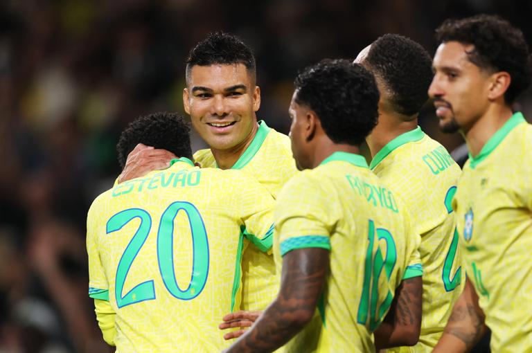 LONDON, ENGLAND - NOVEMBER 15: Casemiro of Brazil celebrates with teammate Estevao after scoring his team's second goal during the International Friendly between Brazil and Senegal at Emirates Stadium on November 15, 2025 in London, England. (Photo by Ryan Pierse/Getty Images)