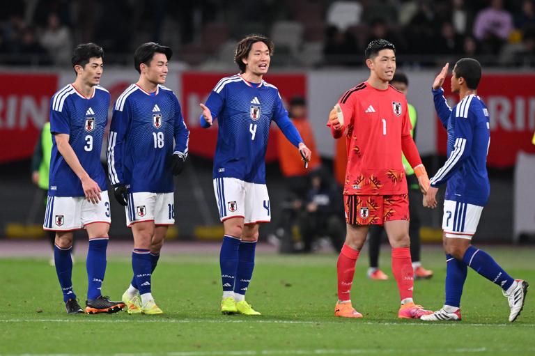 Japan players celebrate the team's 3-0 victory in the international friendly match between Japan and Bolivia at National Stadium on November 18, 2025 in Tokyo, Japan.